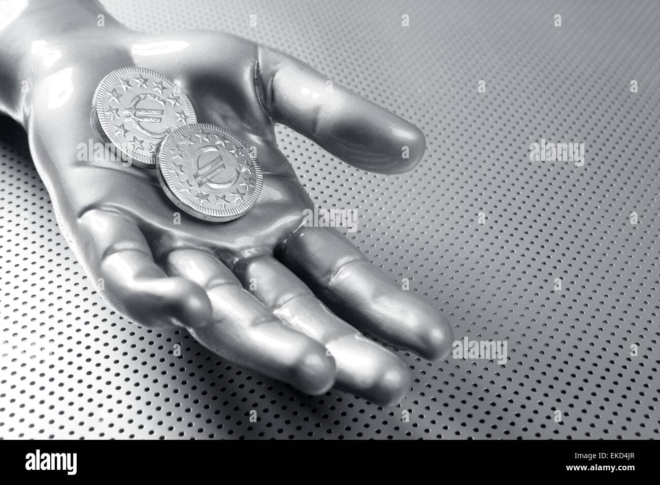 futuristic euro business coin silver hand Stock Photo - Alamy