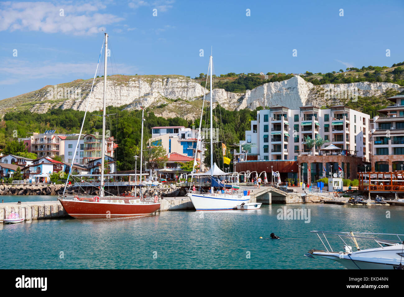 Yachts and pleasure motor boats are moored in bay of Balchik, Bulgaria Stock Photo