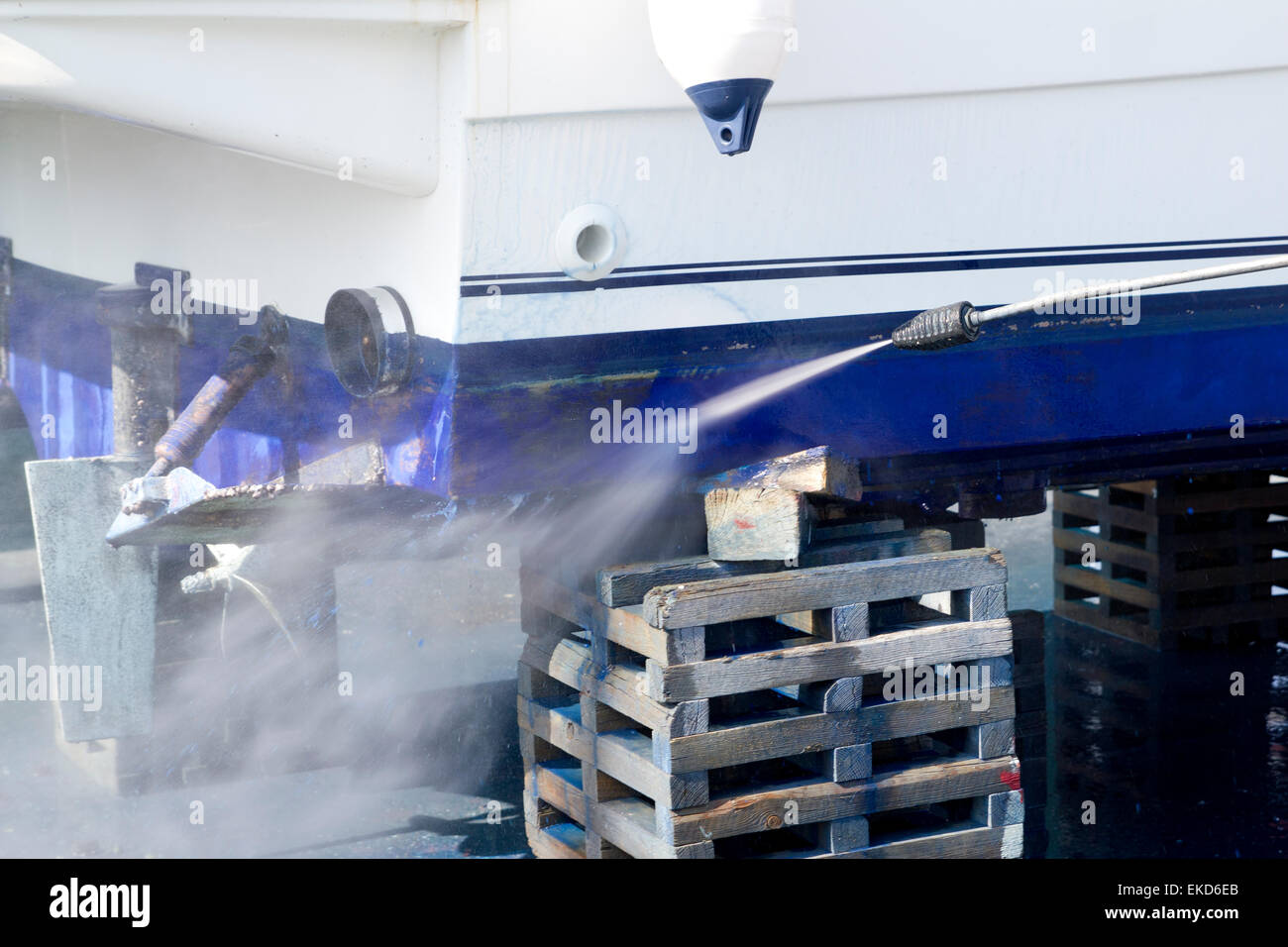 Boat hull cleaning water pressure washer Stock Photo Alamy