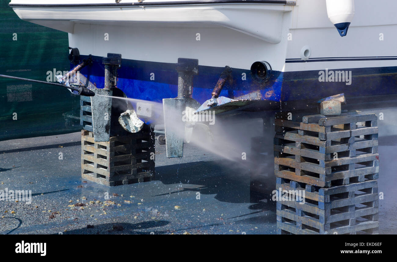 Boat hull cleaning water pressure washer Stock Photo Alamy