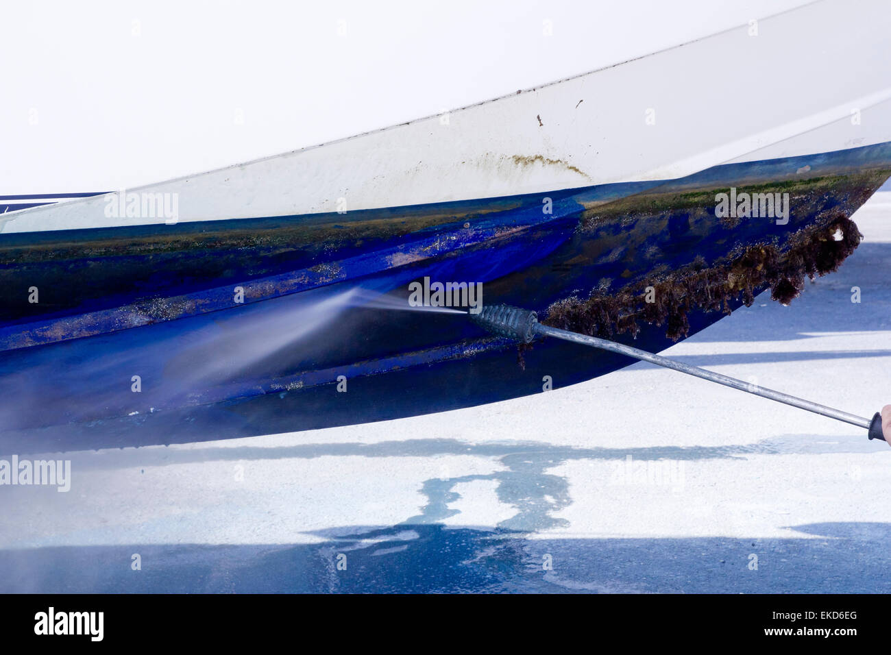 Boat hull cleaning water pressure washer Stock Photo Alamy