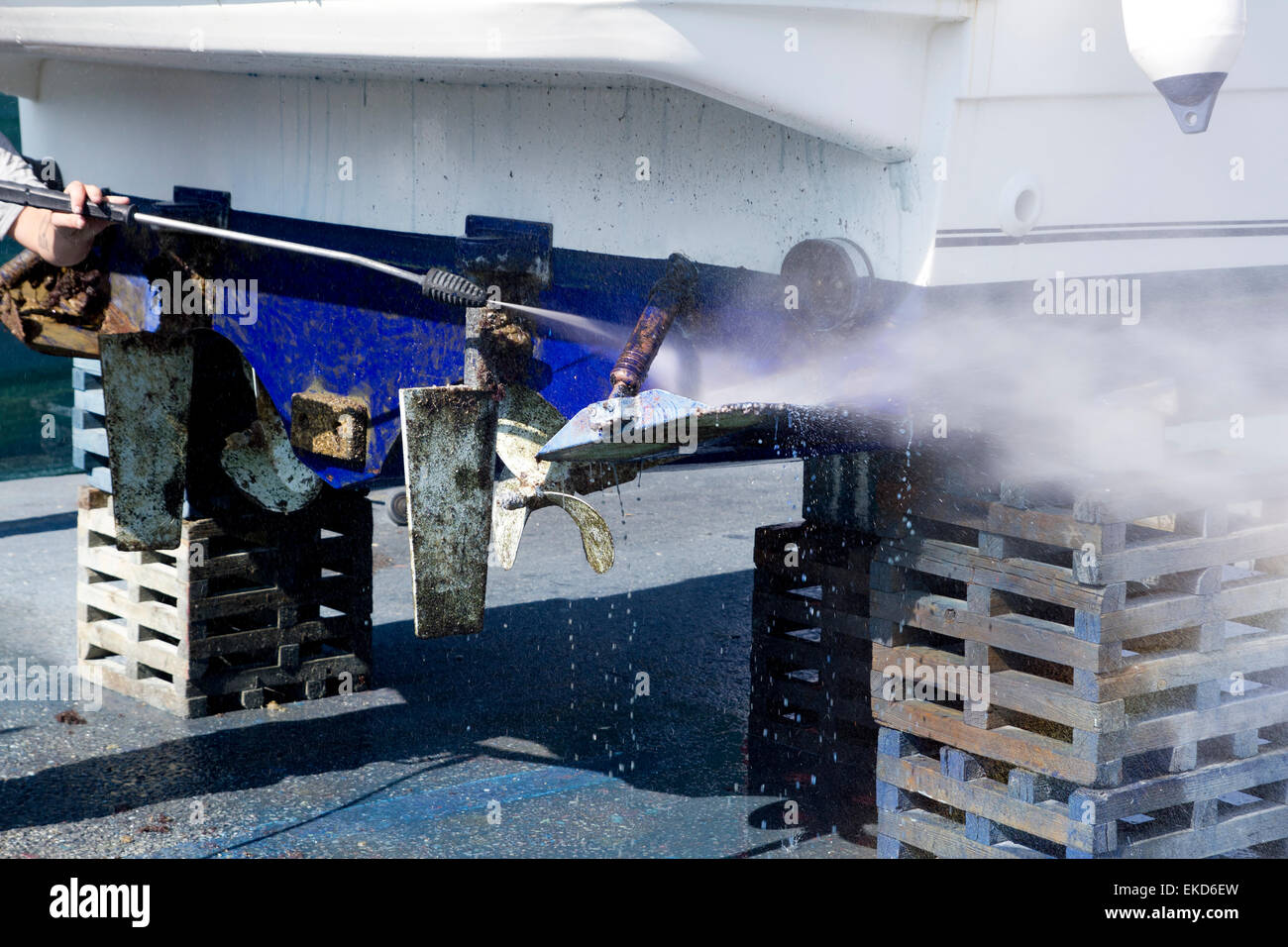 Boat hull cleaning water pressure washer Stock Photo Alamy