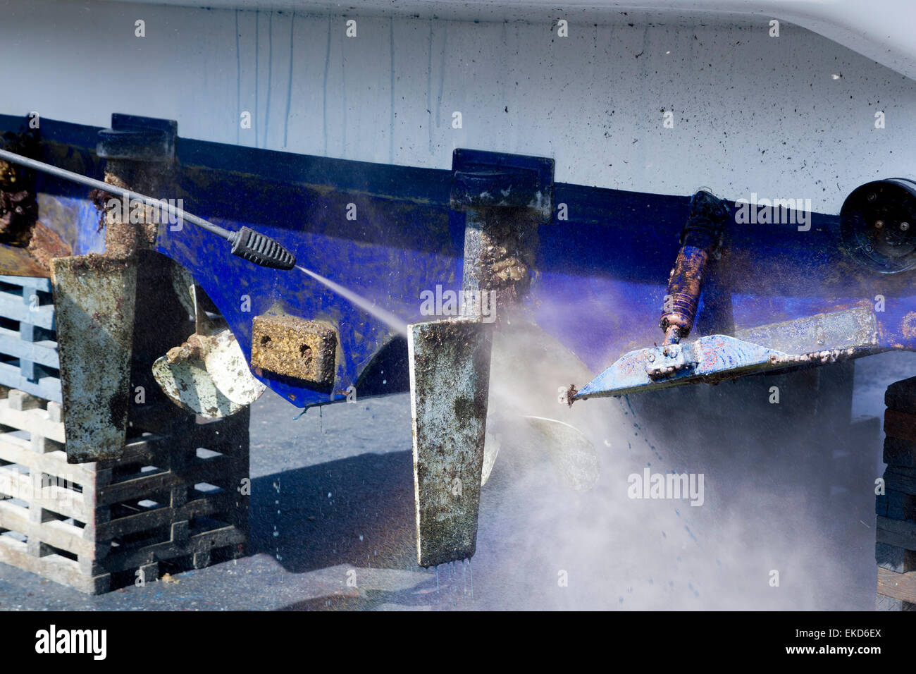 Boat hull cleaning water pressure washer Stock Photo Alamy