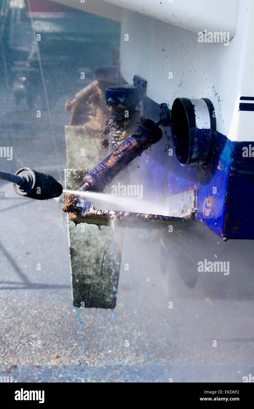 Boat hull cleaning water pressure washer Stock Photo Alamy