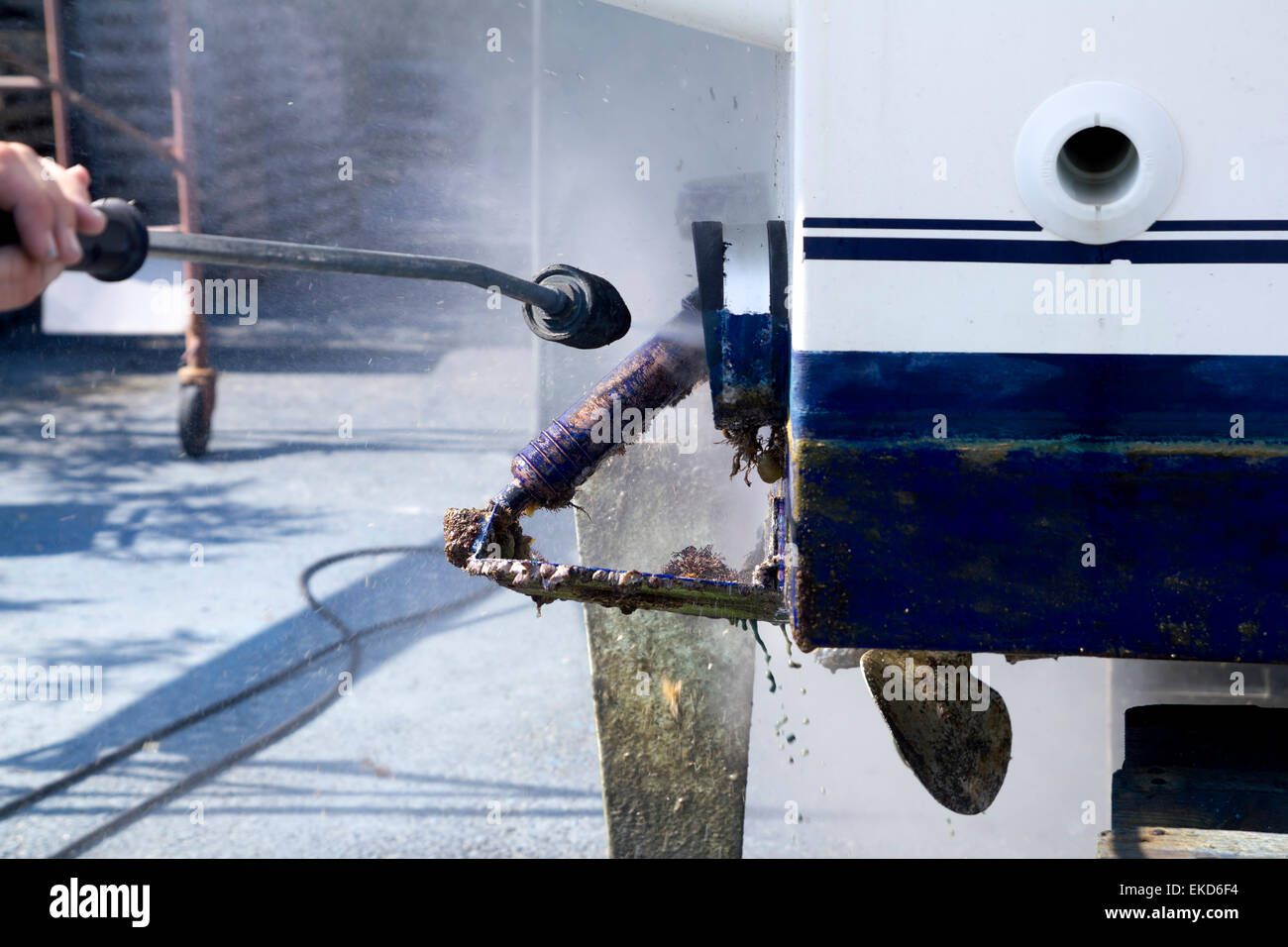 Boat hull cleaning water pressure washer Stock Photo Alamy