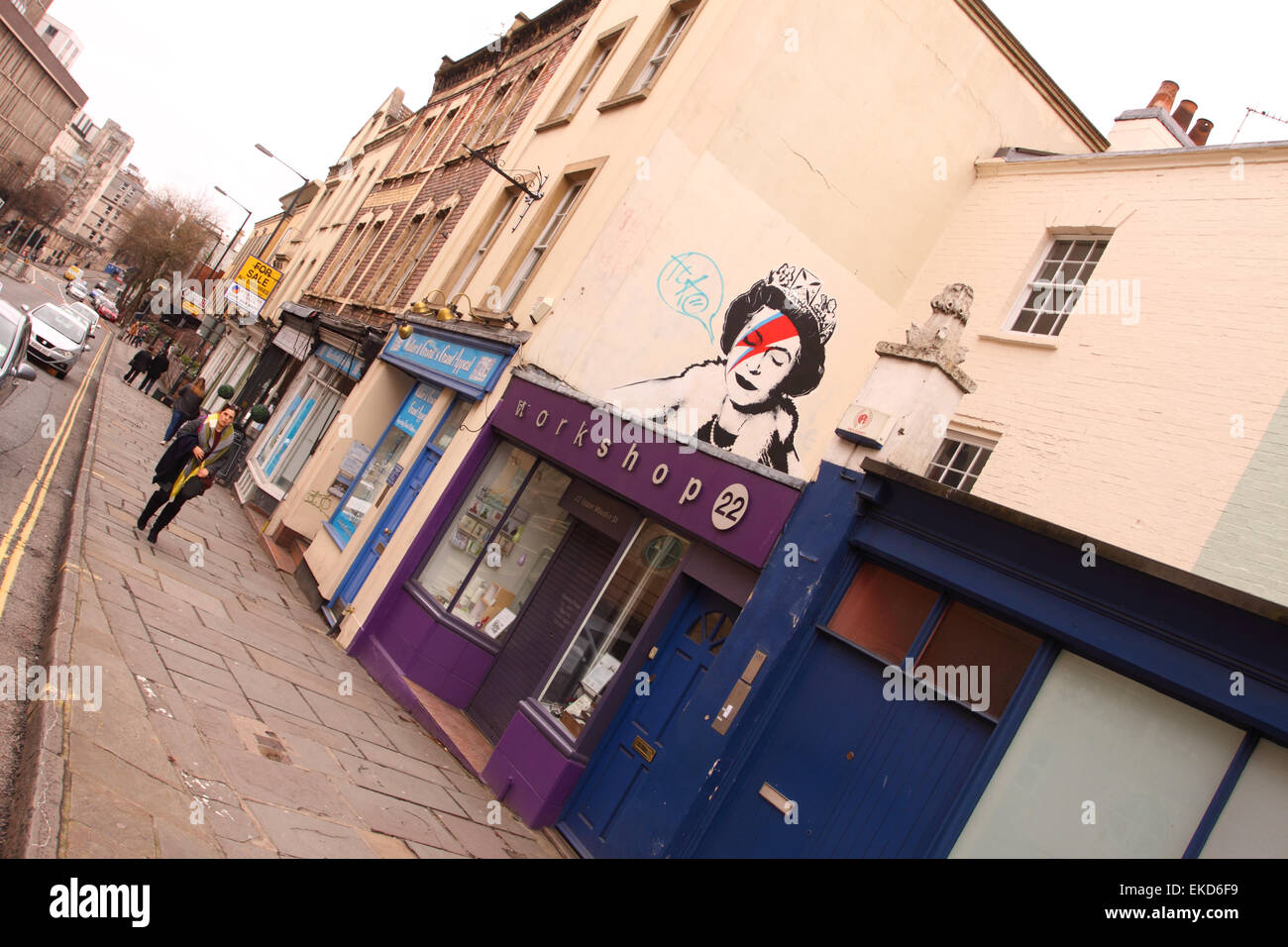 Street art by Incwel titled Still Sane shows Queen Elizabeth II with Aladin Sane style lightning flash. Bristol UK Stock Photo