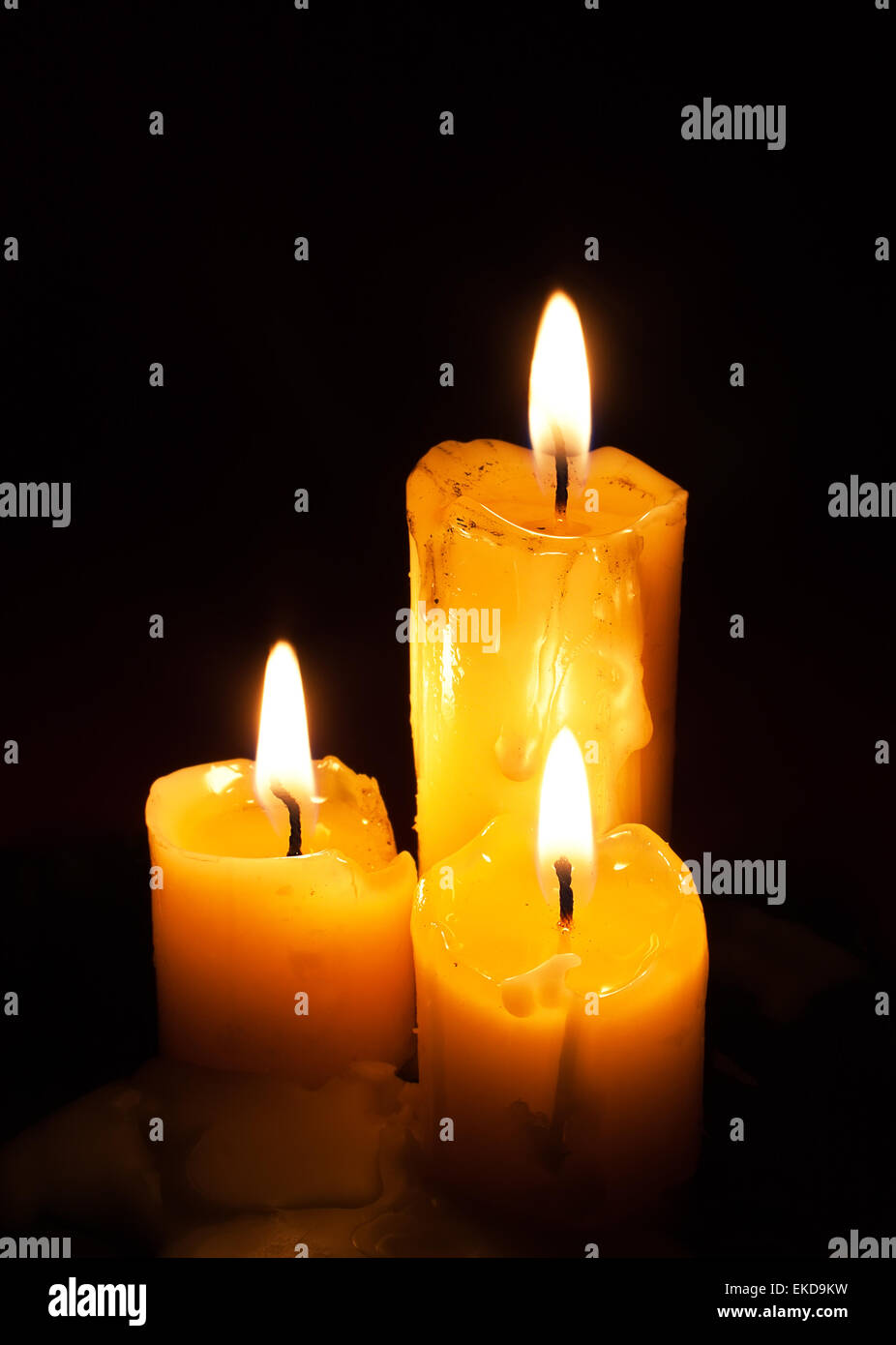Three old white candles Stock Photo Alamy