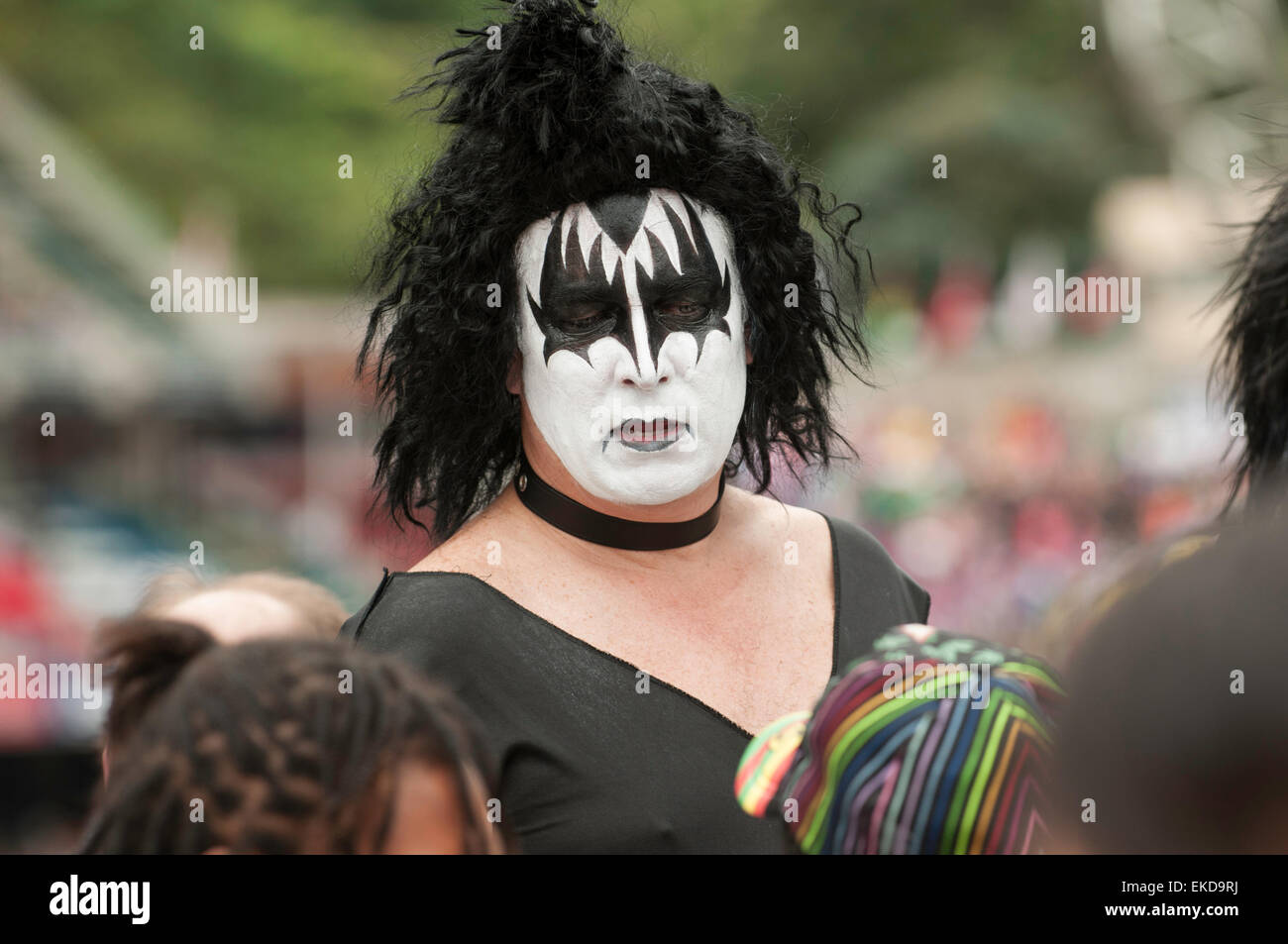 Man dressed as Gene Simmons of Kiss attending Hong Kong Sevens Stock Photo
