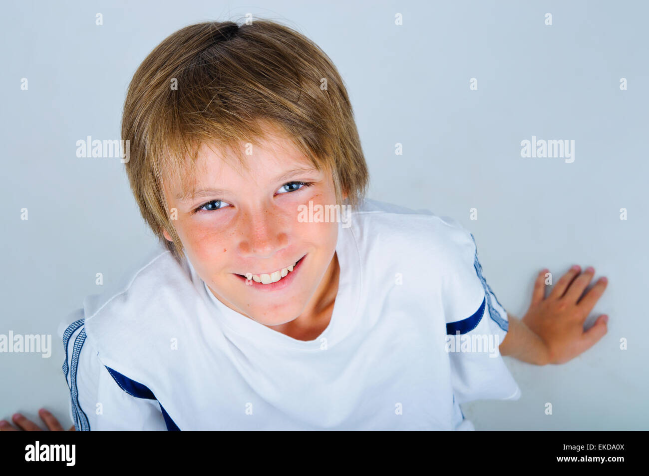 Portrait of young beautiful boy in white Stock Photo - Alamy