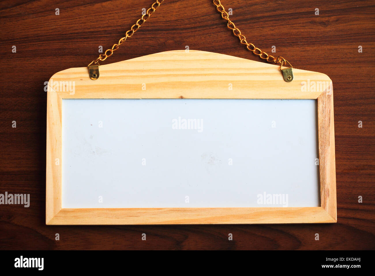 Whiteboard on wood background Stock Photo - Alamy
