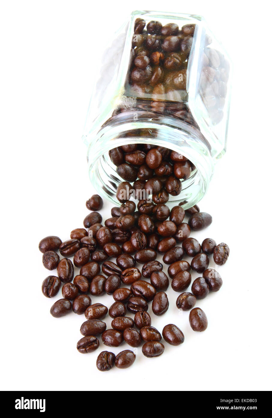 Coffee beans in a glass jar on white background Stock Photo - Alamy