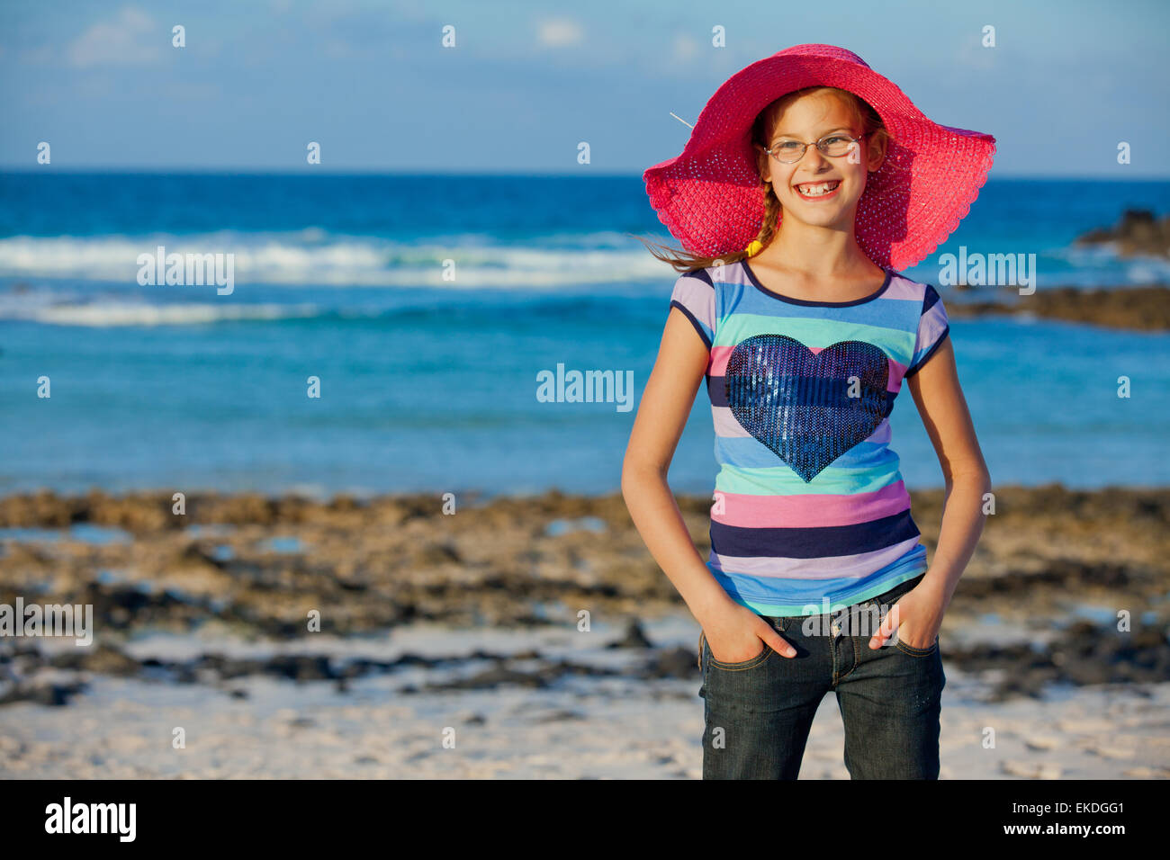 Girl in hat relax ocean background Stock Photo