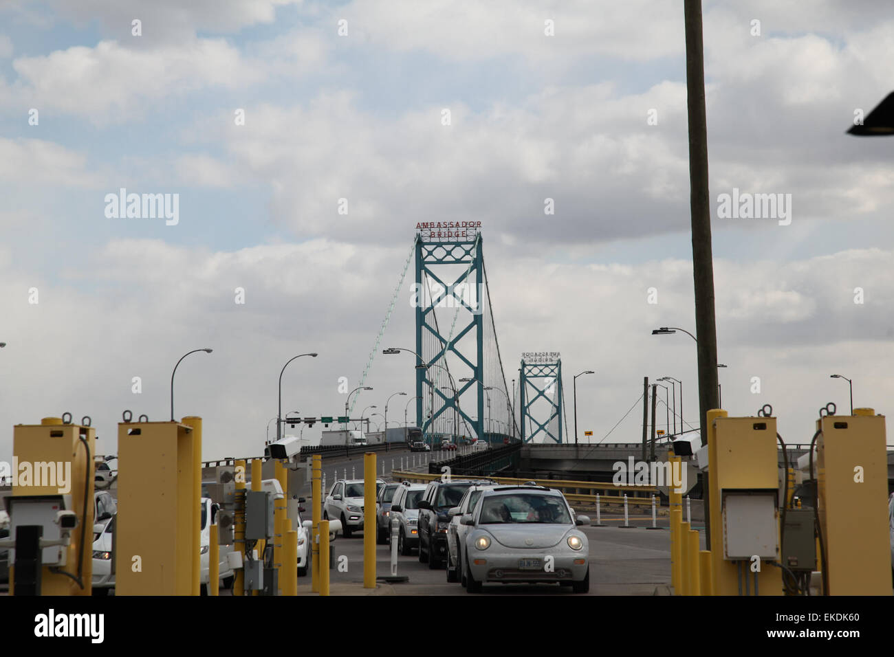 040213: Cars approach the primary entry lanes to the U.S. at the Ambassador Bridge in Detroit, Michigan.  : Kris Grogan Stock Photo