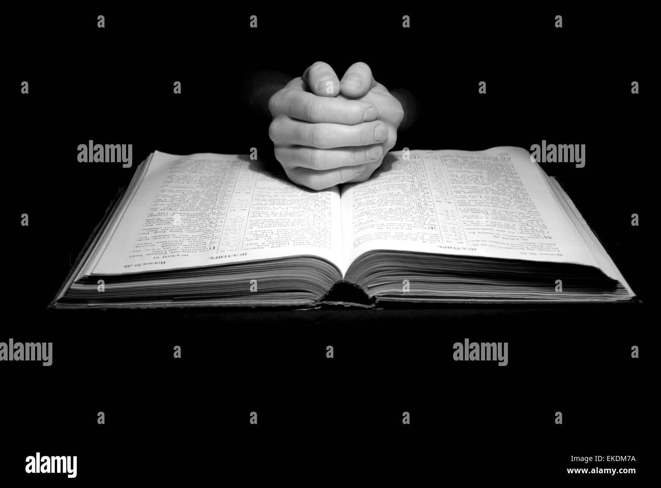 hands on biblie Stock Photo