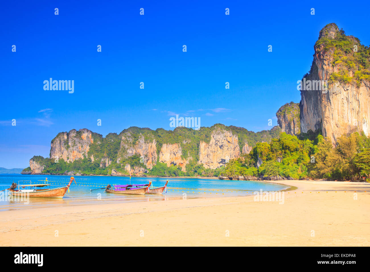 Longtail boats at the west Railay beach Stock Photo