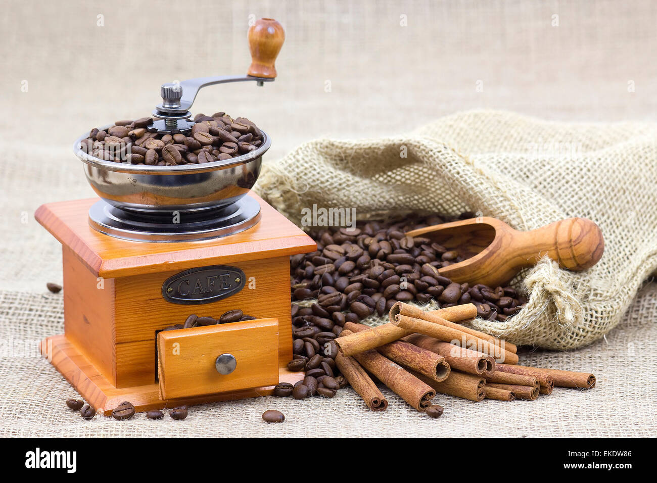 cinnamon sticks, coffee beans and coffee grinder Stock Photo Alamy