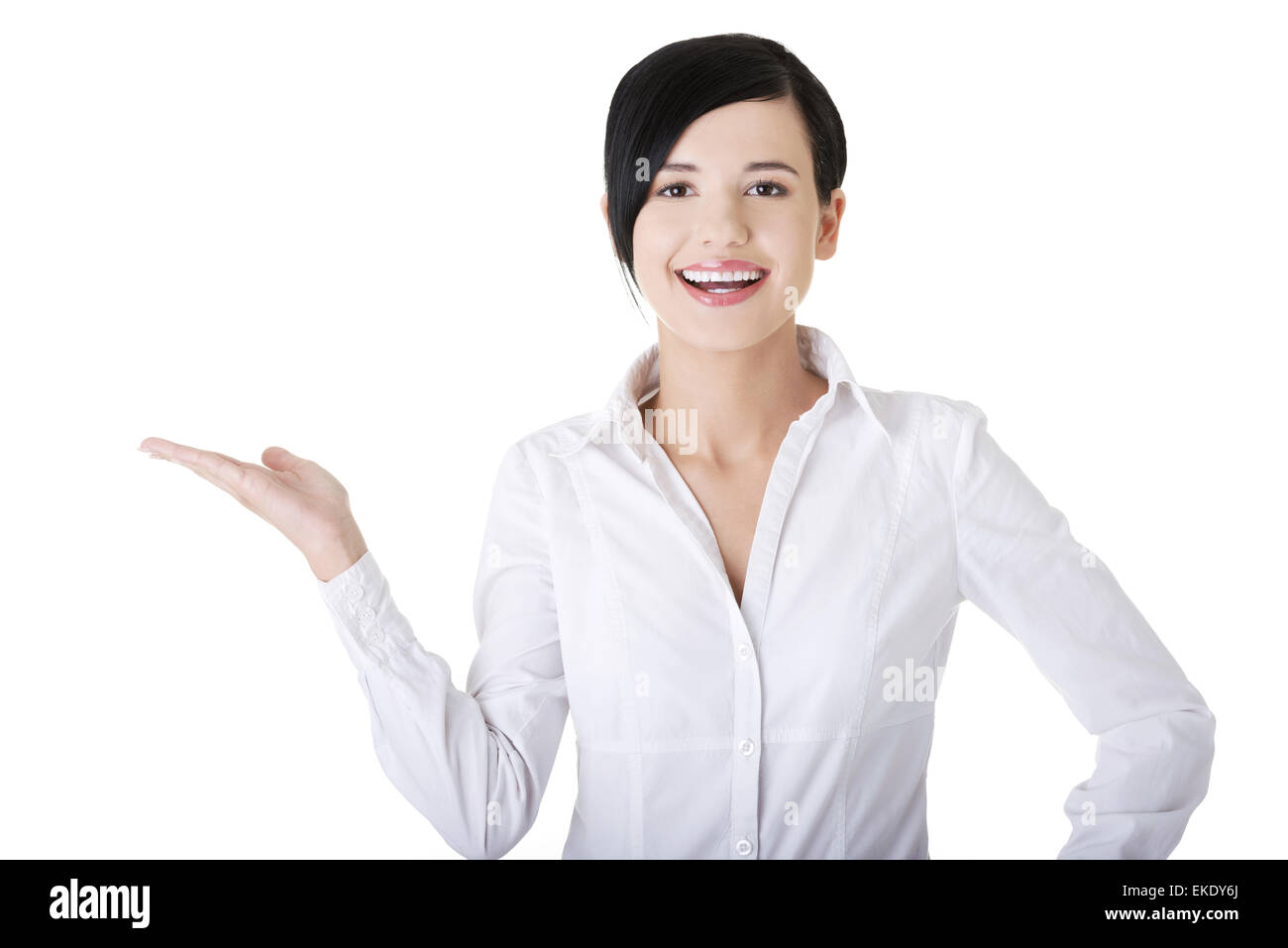 Beautiful business woman showing copy space Stock Photo - Alamy