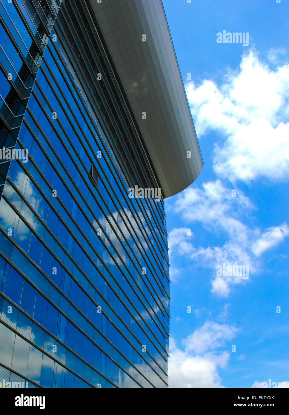 Modern office building and blue sky reflection Stock Photo - Alamy