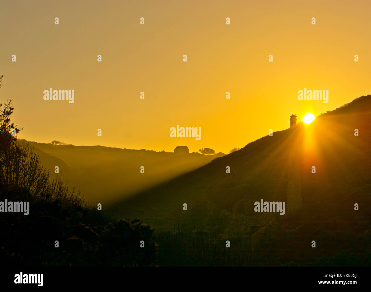 Kenidjack valley Cornwall sunrise tin mine chimney Stock Photo - Alamy