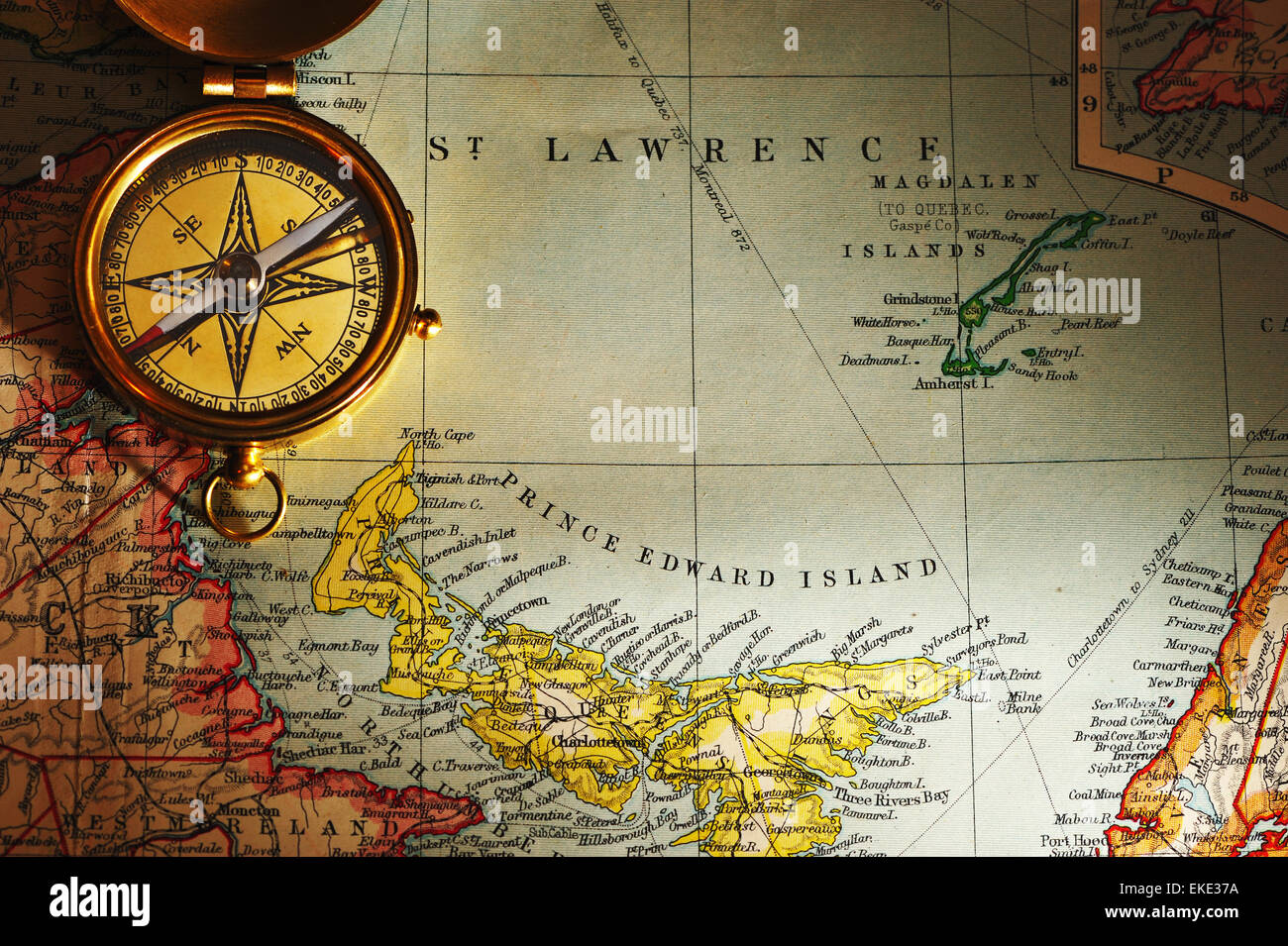 Antique brass compass over old Canadian map Stock Photo Alamy