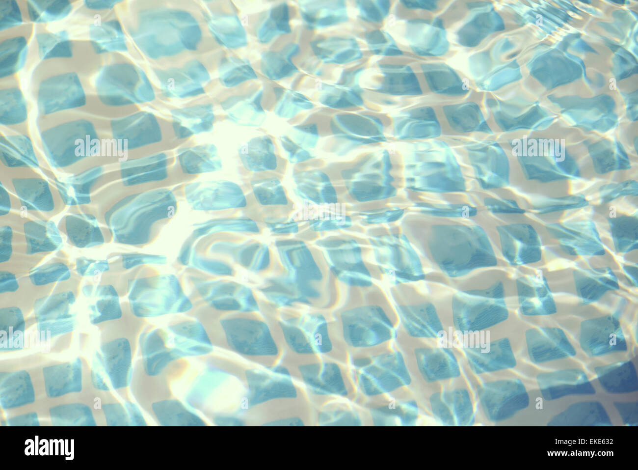 Retro swimming pool rippled summer water texture. Vintage soft color hipster style. Stock Photo