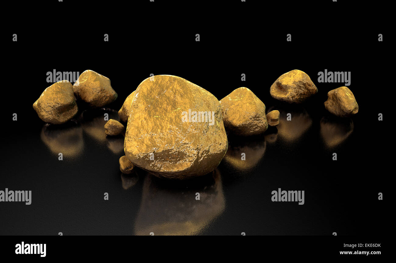 A collection of gold nuggets on an isolated dark background Stock Photo