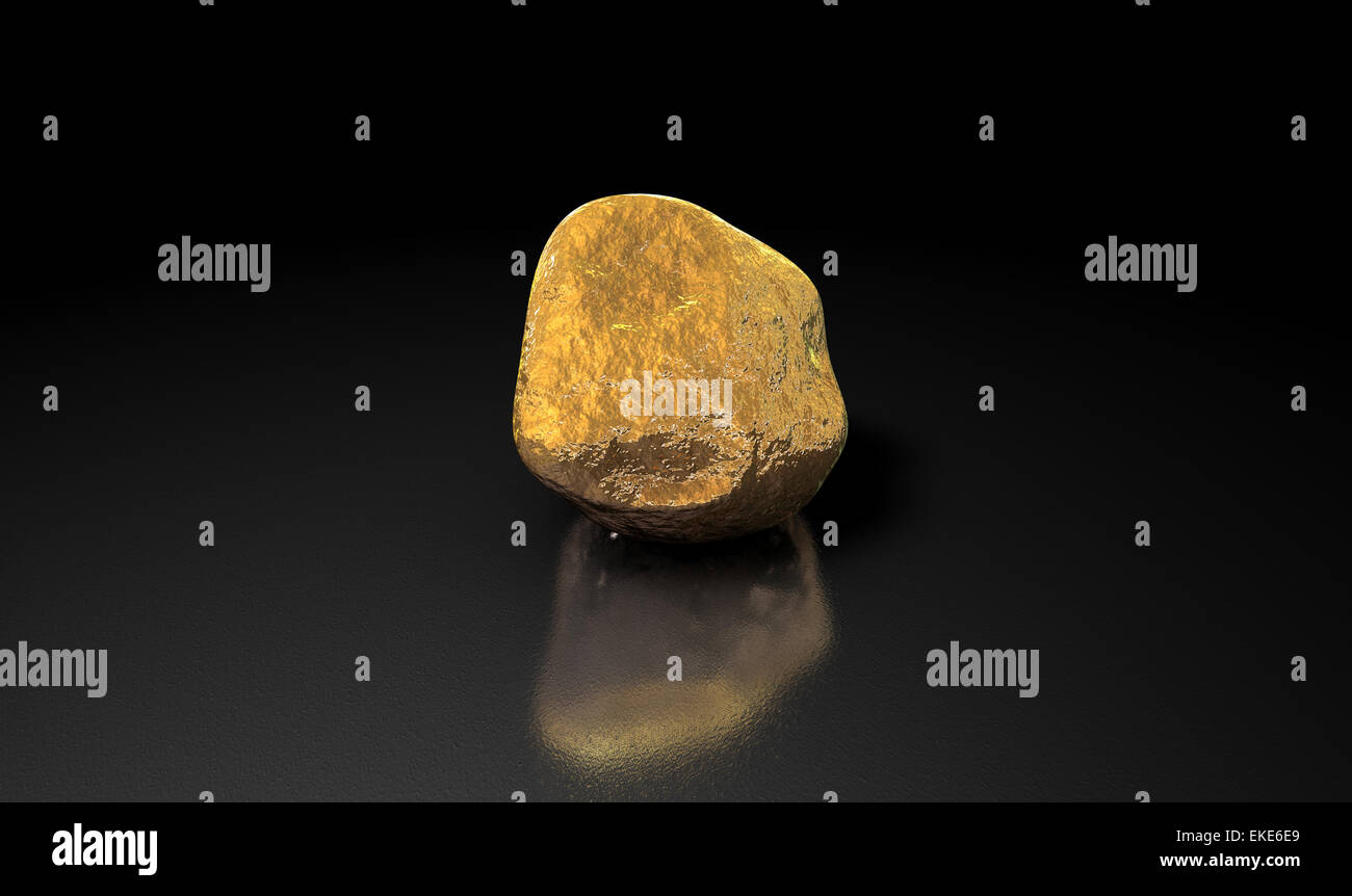 A gold nugget on an isolated dark background Stock Photo