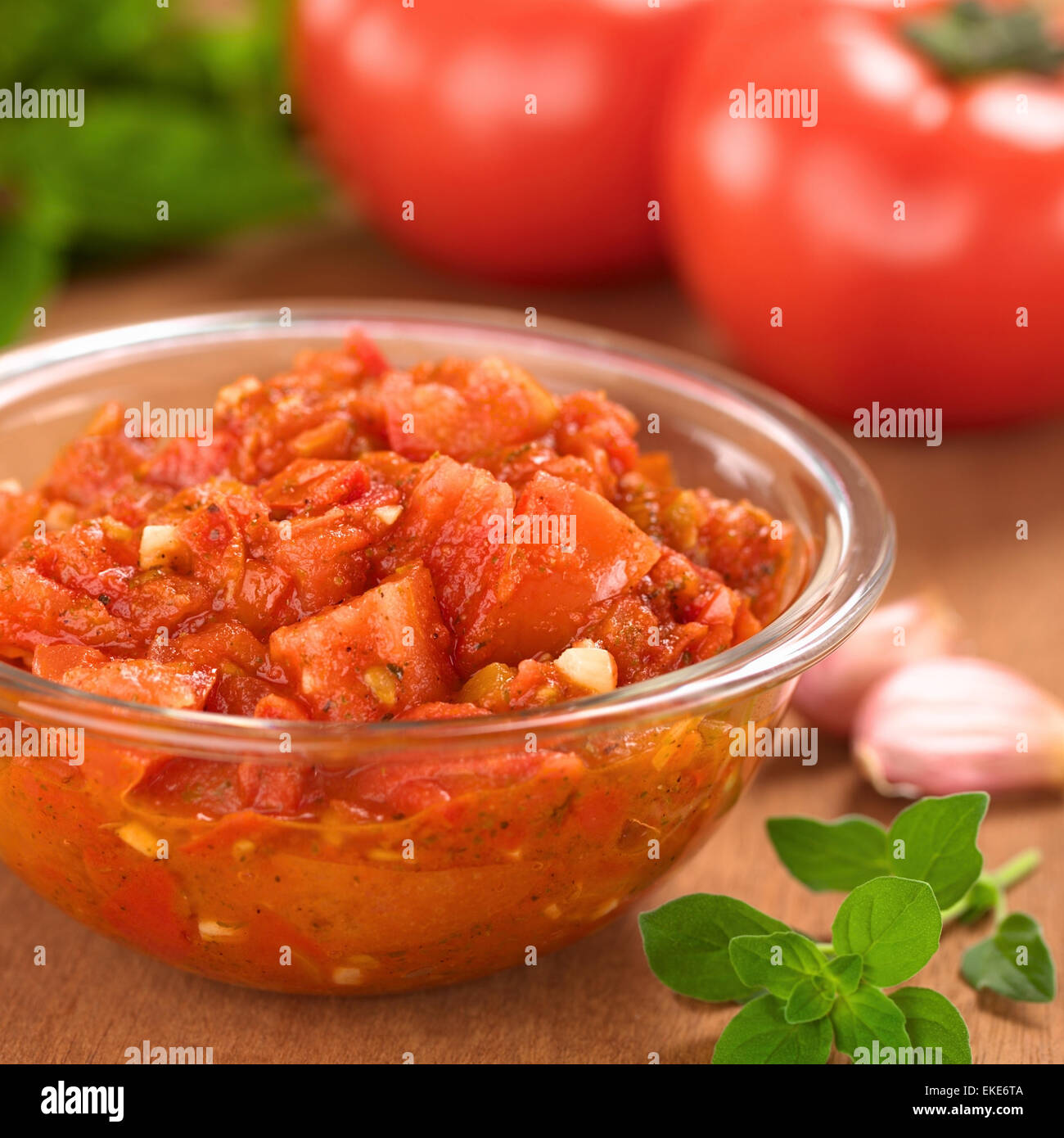 glass bowl of fresh homemade tomato sauce for pizza made of fresh