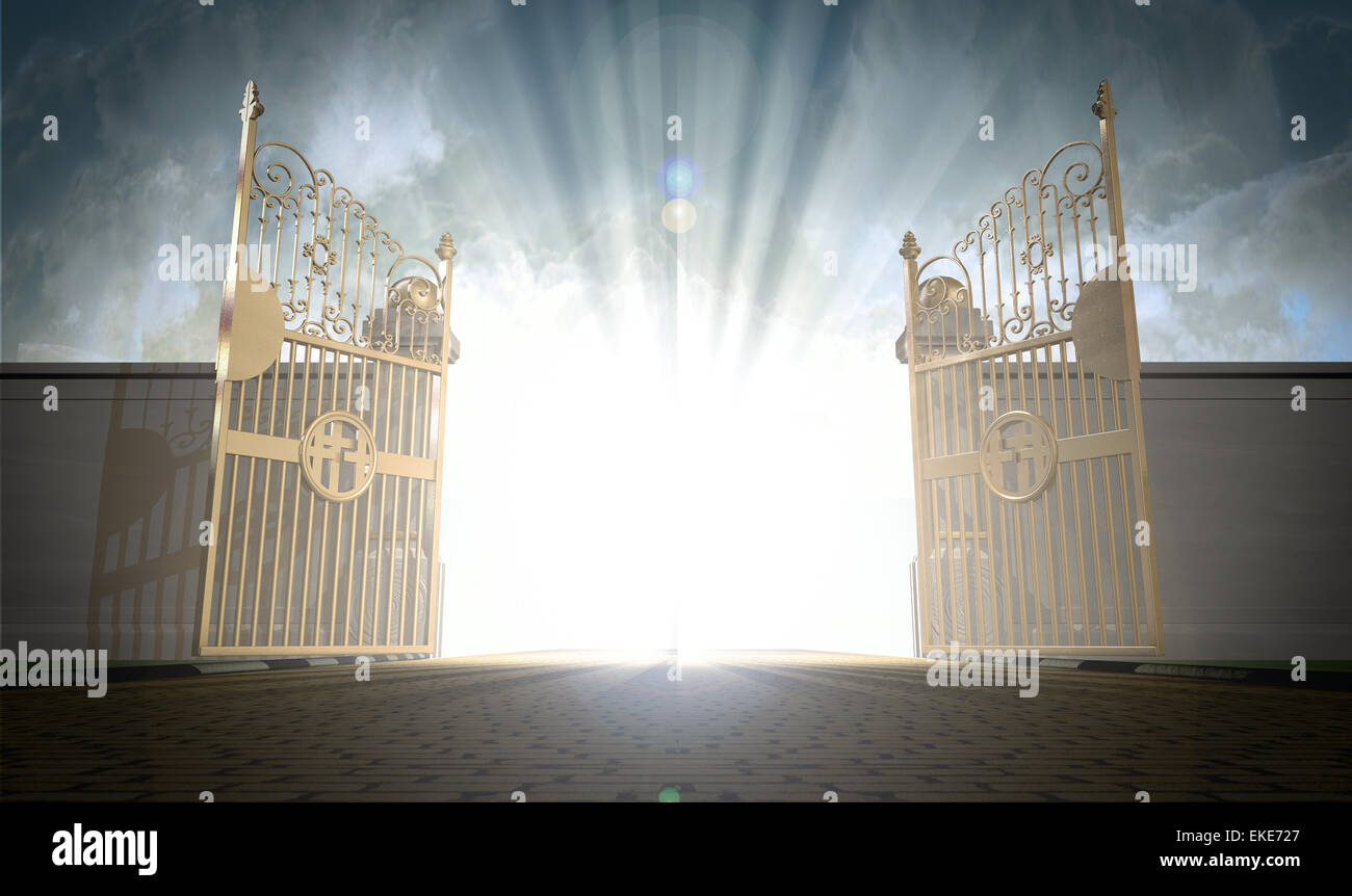 A depiction of the pearly gates of heaven open with the bright side of heaven contrasting with the duller foreground Stock Photo