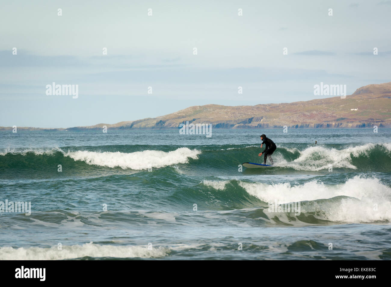 Surfing along the Wild Atlantic Way on the West Coast of Ireland Stock Photo