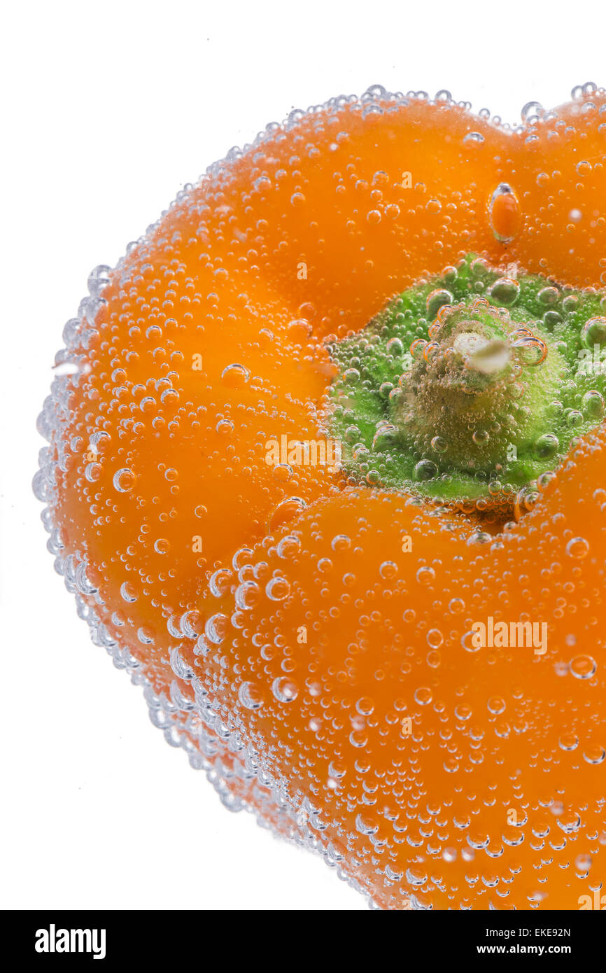 Fresh pepper in water with bubbles Stock Photo