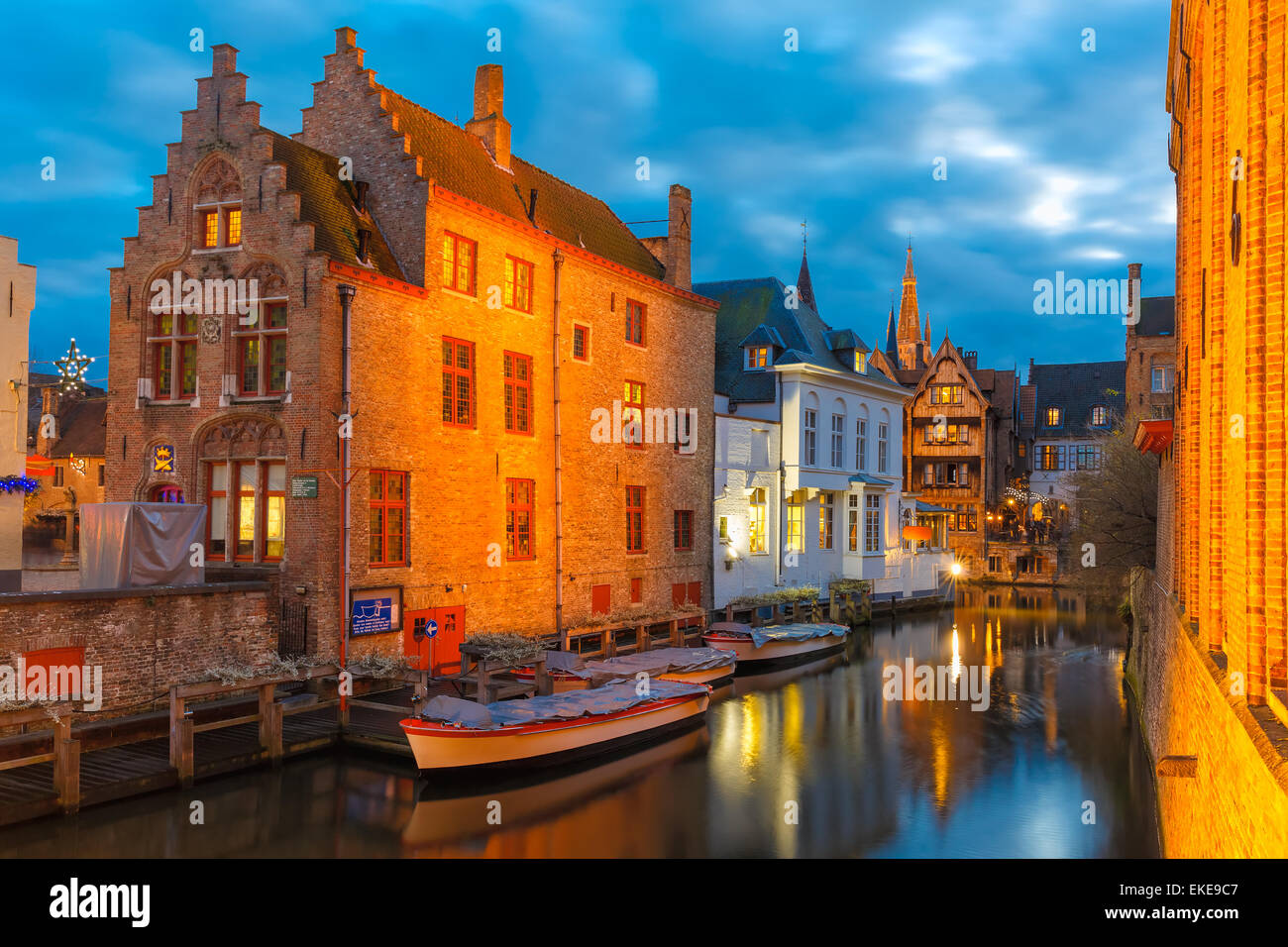 Cityscape with the picturesque night canal Dijver in Bruges Stock Photo