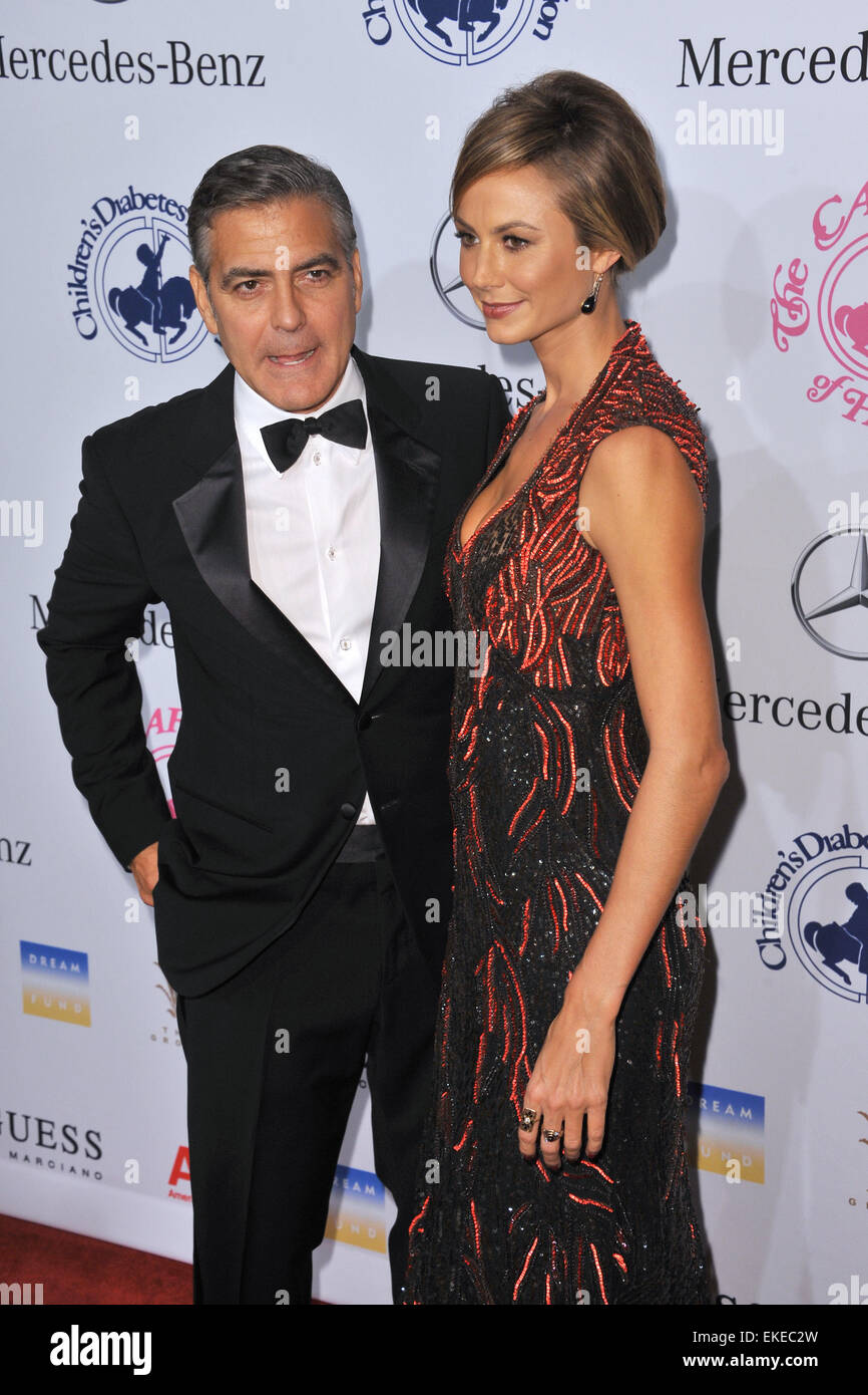 BEVERLY HILLS, CA - OCTOBER 20, 2012: George Clooney & Stacy Keibler at the 26th Carousel of Hope Gala at the Beverly Hilton Hotel. Stock Photo