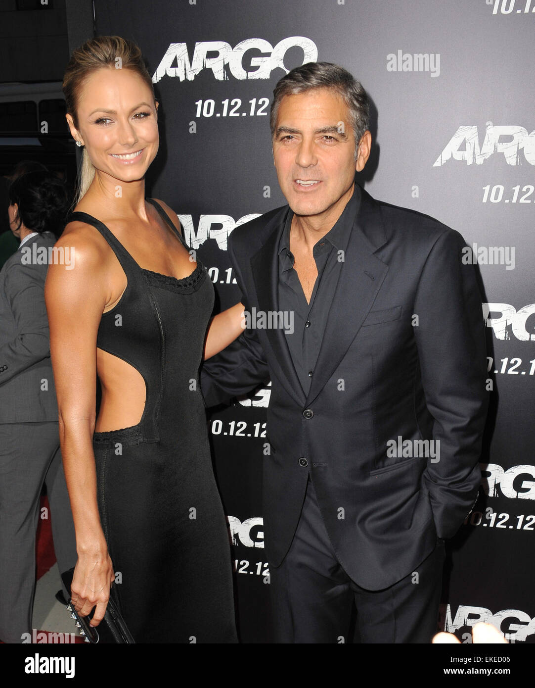 BEVERLY HILLS, CA - OCTOBER 4, 2012: George Clooney & Stacy Keibler at the Los Angeles premiere of 'Argo,' which he produced, at the Samuel Goldwyn Theatre, Beverly Hills. Stock Photo