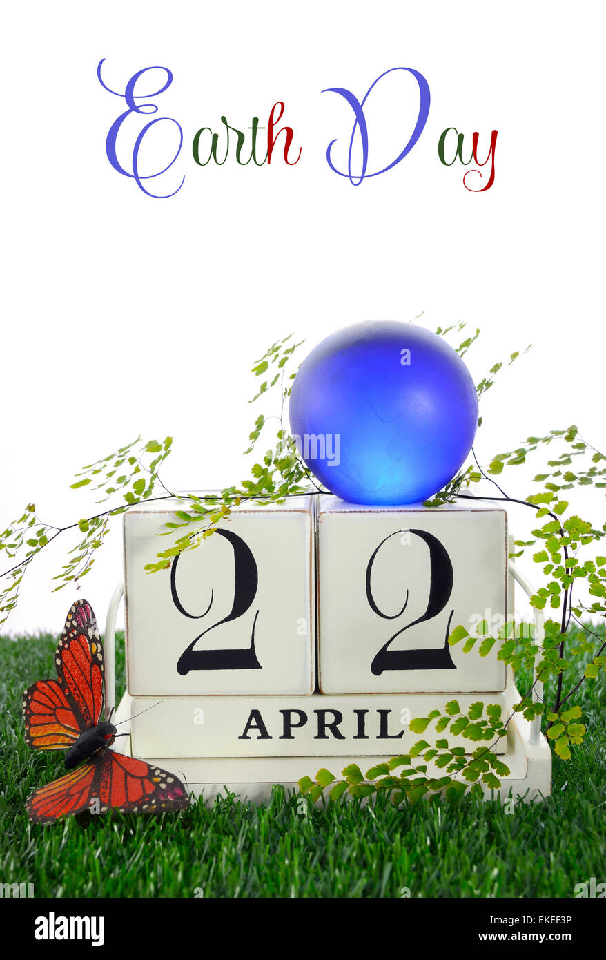 Earth Day, April 22, Concept with retro style wood calendar with blue