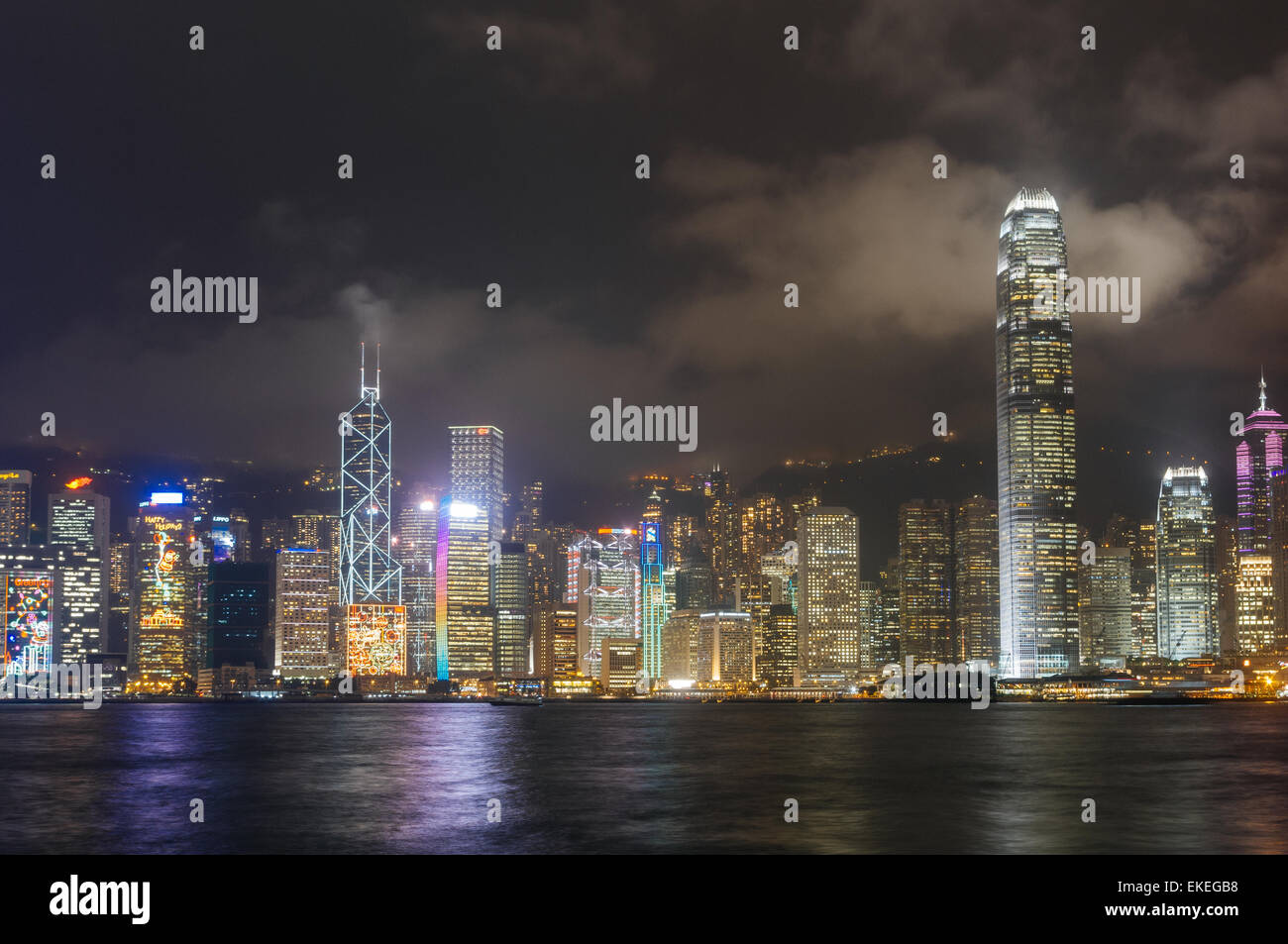 Skyline of Hong Kong Victoria Harbour at night. Stock Photo