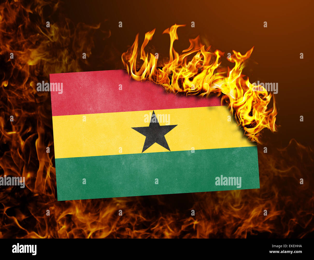 Flag burning - concept of war or crisis - Ghana Stock Photo
