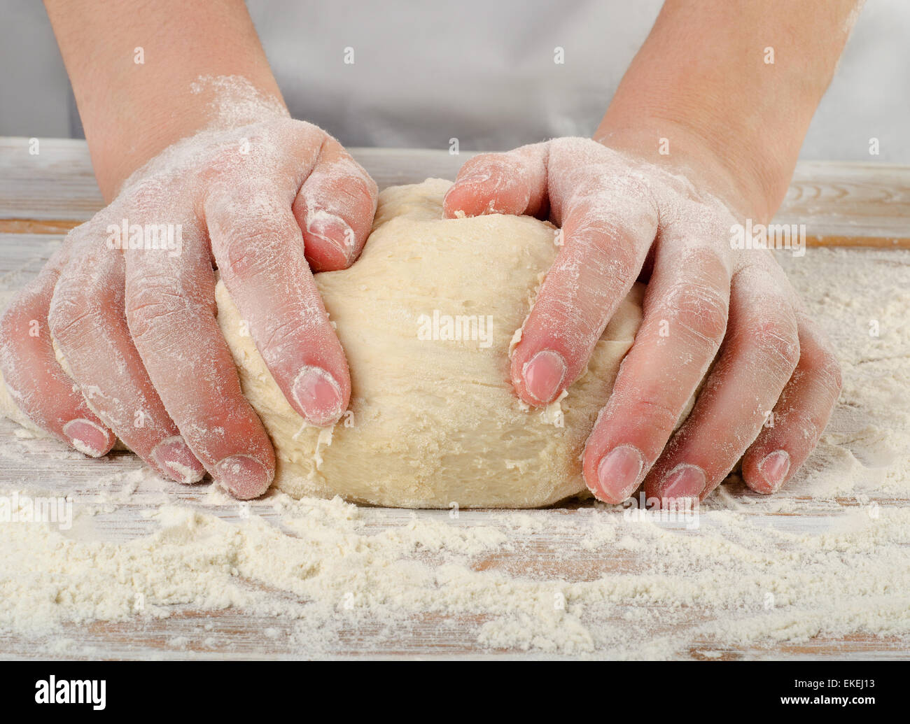 Woman Hands kneading dough . Selective focus Stock Photo - Alamy