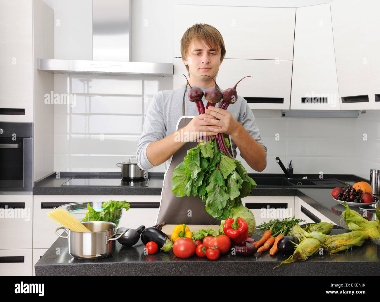 Man Using Kitchen Machine Man in kitchen Stock Photo - Alamy