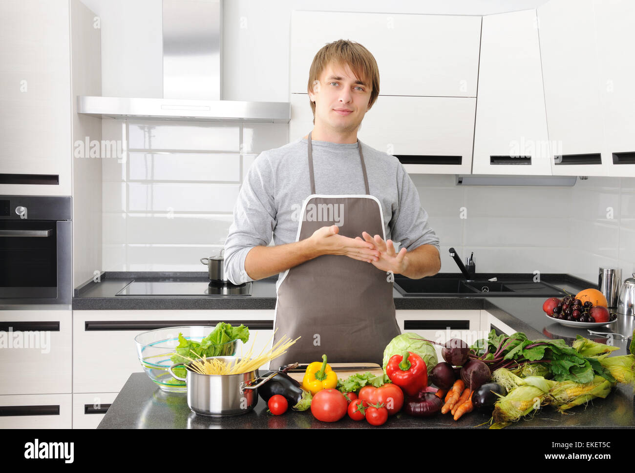 Man Using Kitchen Machine Man in kitchen Stock Photo - Alamy