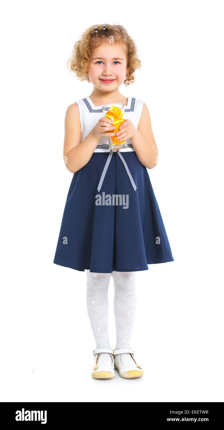 Little girl drinking orange juice Stock Photo - Alamy