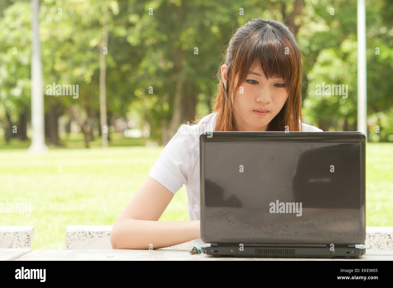 Young Asian woman working Stock Photo - Alamy