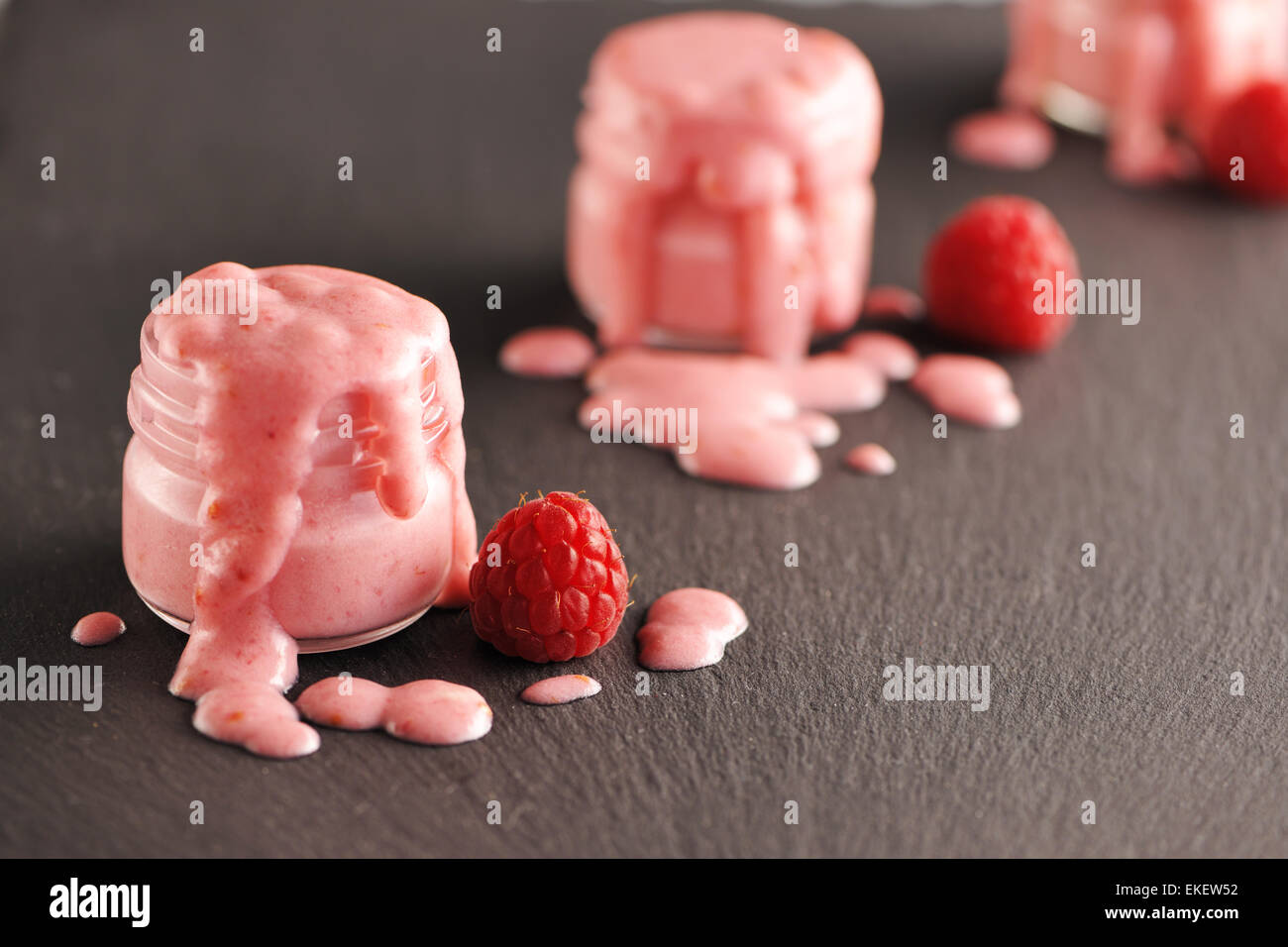 Yoghurt Coated Raspberry Fresh yogurt with raspberry Stock Photo - Alamy
