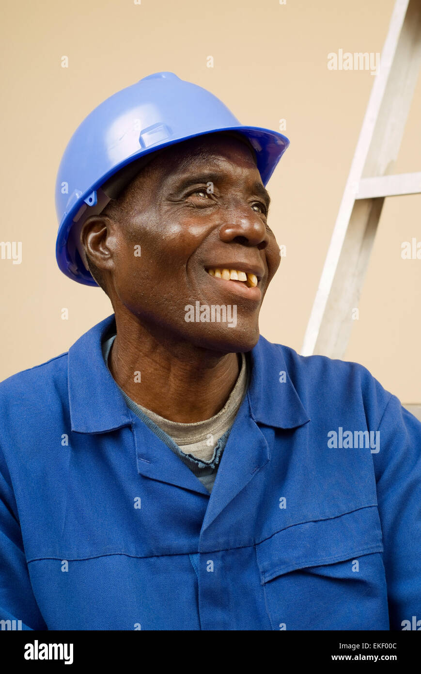 Happy Construction Worker Resting on Ladder Steps Stock Photo - Alamy