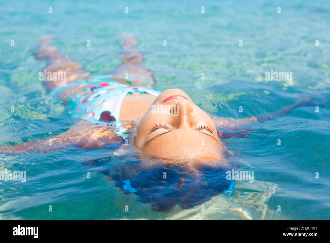 Young girl in the sea Stock Photo