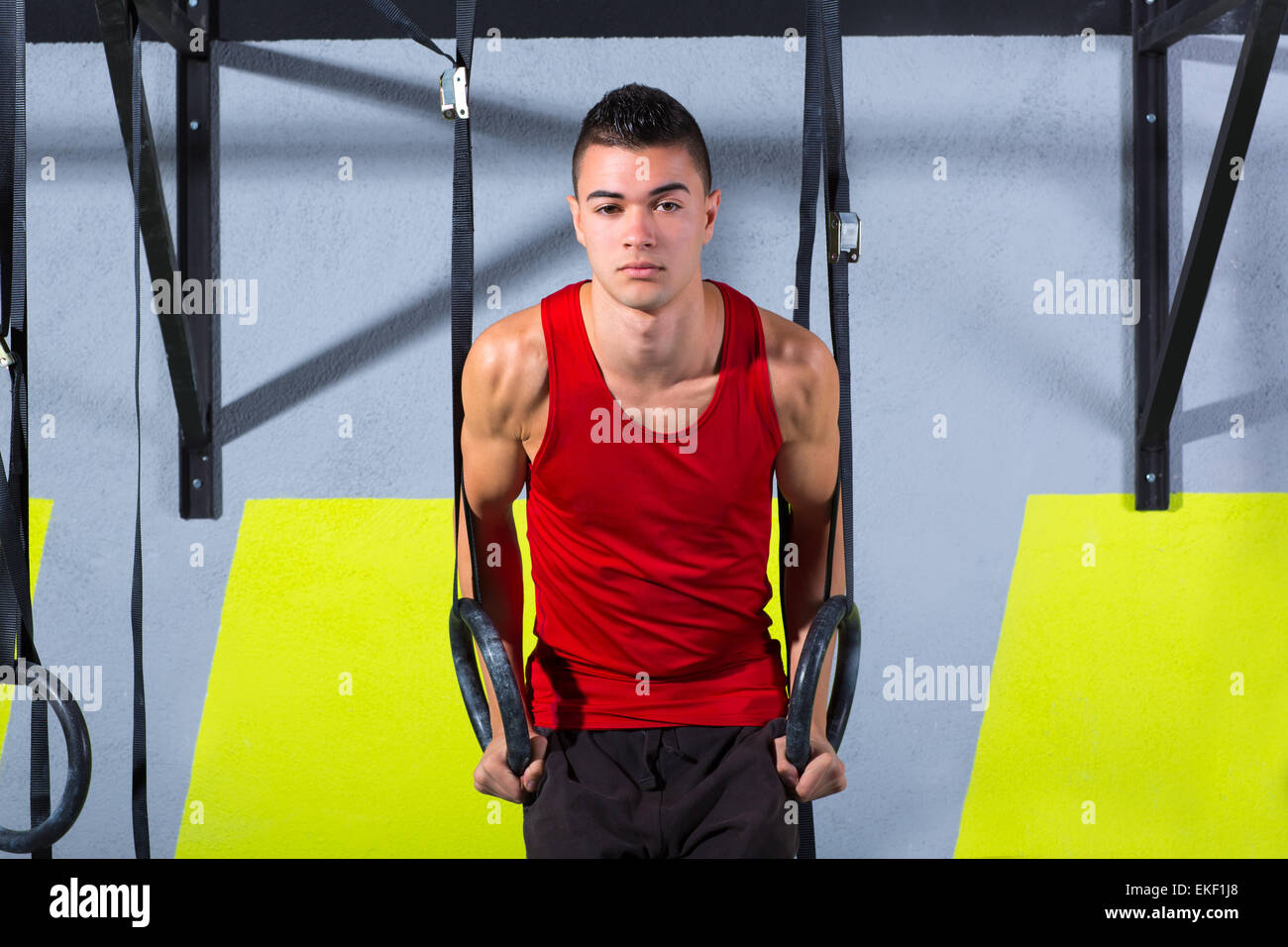 Crossfit dip ring young man workout at gym dipping Stock Photo Alamy