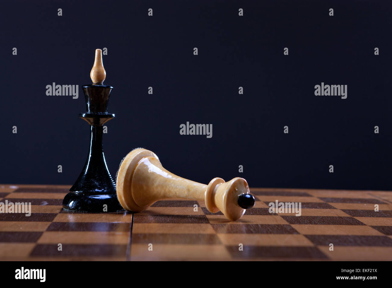 victory over king Queen in chess Stock Photo