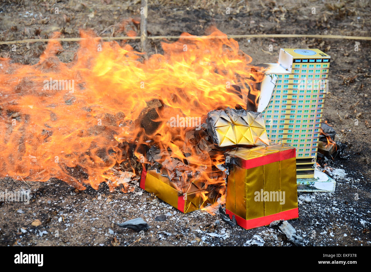 chinese new year traditions burning money