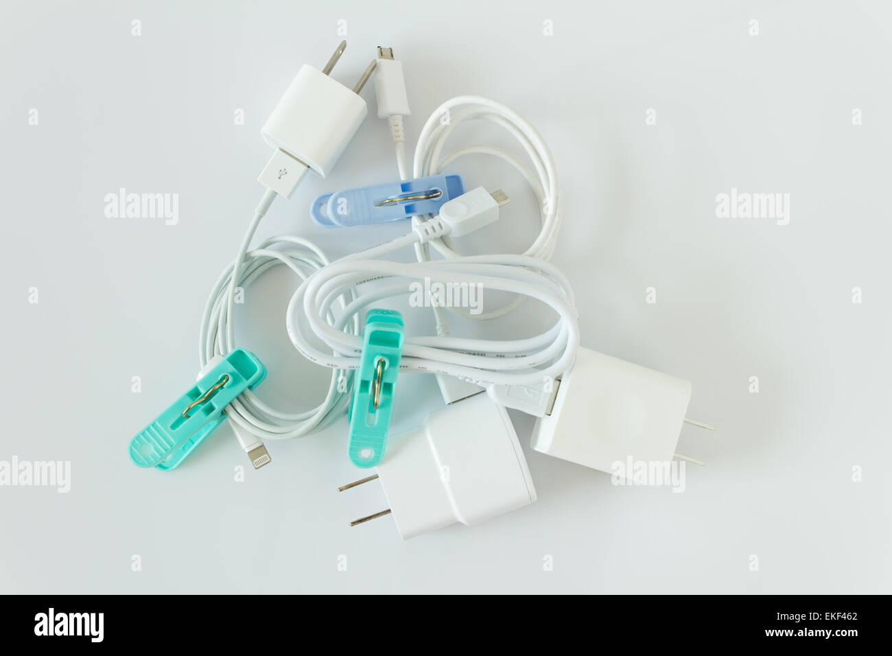 Battery charger and wires tech mess keeping in good Stock Photo Alamy