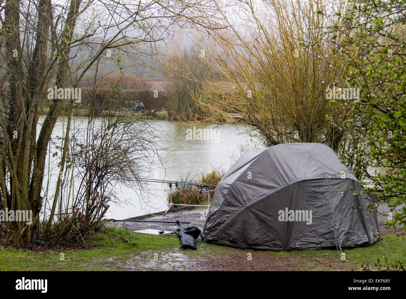 course fishing camping bivi pond lake still water specimen fish spring countryside sports rods Stock Photo